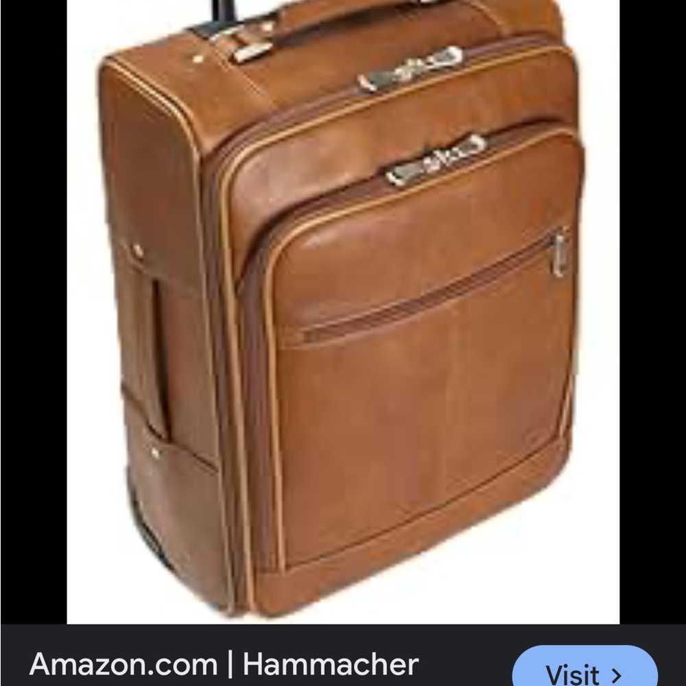 ISO Hammacher schlemmer rolling suitcase